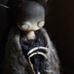 Mahlimae, She would rather walk alone in darkness than follow anyone else’s shadow. - R.G. Moon, stone clay, various textiles, feathers, hemp fibre, rainbow moonstone, puffer fish barbs, dried wren claw, marsupial teeth, 17cm, $420