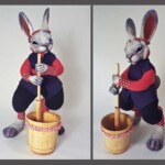 Carisa Swenson, Moon Mochi, paperclay, resin, fabric, wire, acrylic paints, wood (barrel and pestle), 12.5” high by 5” deep, $725