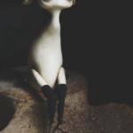 Mahlimae, "Echo VI”, stone clay, obsidian shards, hand blown glass, shell, hand dyed textiles, dried roots, sitting height 14cm, total height to tip of roots 10.6 inches (not poseable), $560