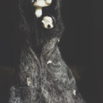 Mahlimae, "Echo VII”, stone clay, moonstone, suri alpaca fibre, Icelandic wool, teeth + bone shards, hand dyed textiles; (infant) - stone clay, hand blown glass, hand dyed textiles, 6.3 inches, $590