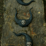 Scott Radke, "Crescent moon (left, right, center, facing)”, Magic sculpt, resin, acrylic paint, 16 x 17 inches (at the longest points) $650 ($1800 for the trio)