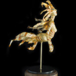 Nikole Cooney, “Liona” Bronze, granite, wood, 18 x 12 x 8 inches, $6,000 (Side View)