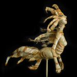 Nikole Cooney, “Liona” Bronze, granite, wood, 18 x 12 x 8 inches, $6,000 (Side View)