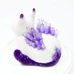 Zoë Williams, "ネコ (Star Neko)", ネコ (Star Neko), wool felt, resin, mixed media, 5.5 x 5.5 x 6.5 in, frame 9 x 9.5 x 9.5 in, $1,000