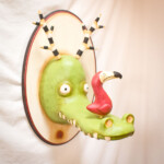 Valency Genis, “Dallas and Harper”, 2020, Epoxy clay, wood, wire, glass, acrylic and oil, 20 x 12 x 15 in, $650